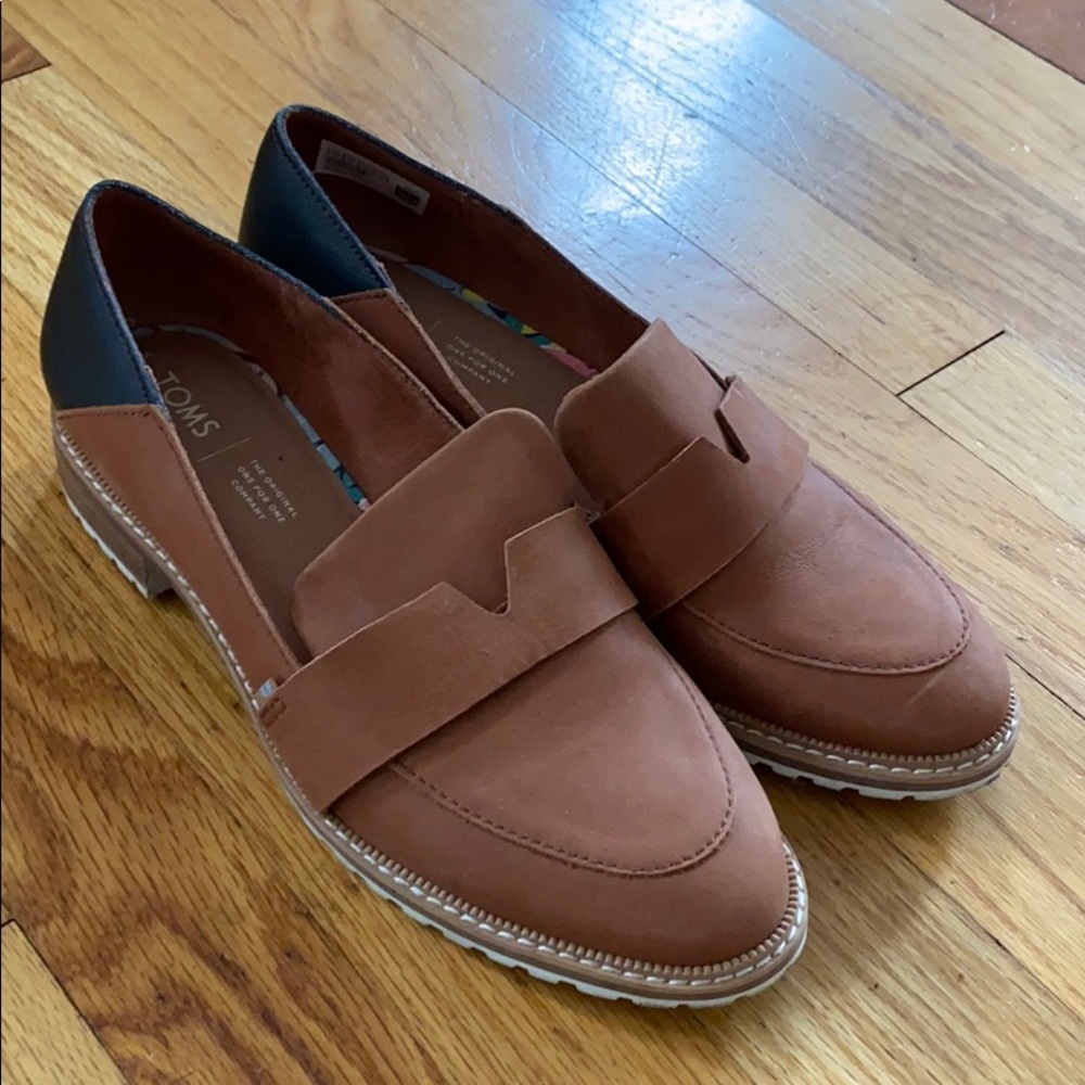 Toms Black and Tan loafers size 9